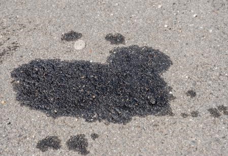 How Professional Oil Stain Removal Extends the Life of Your Driveway